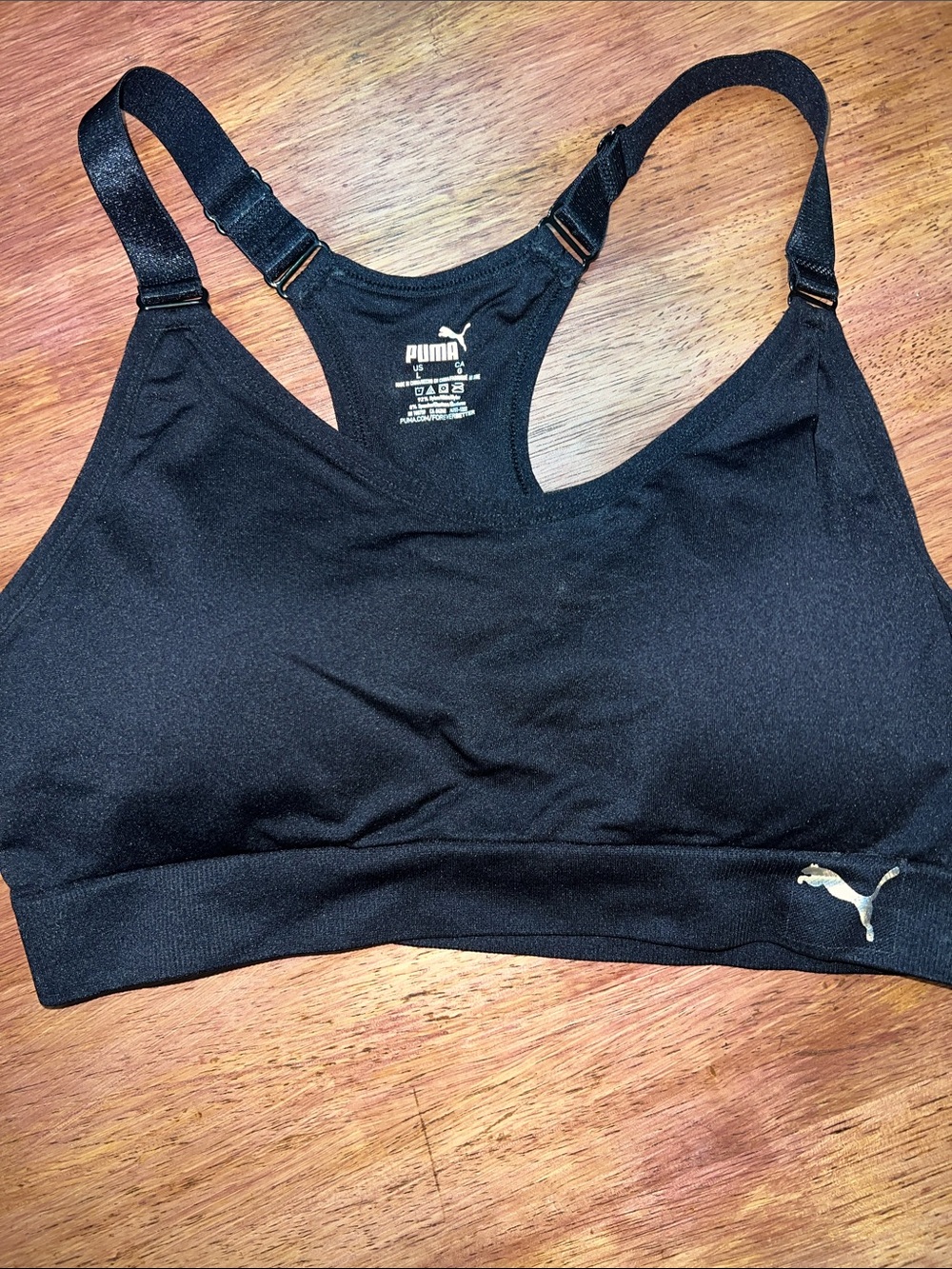 Puma Black Racerback Sports Bra with silver Logo
